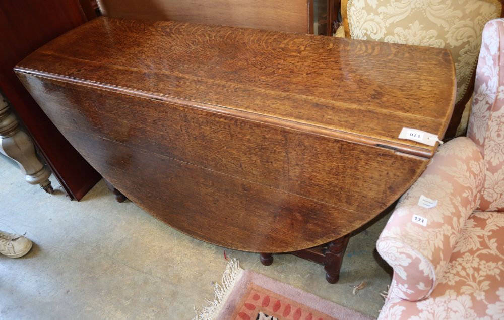 An 18th century oak gateleg table, W.145cm